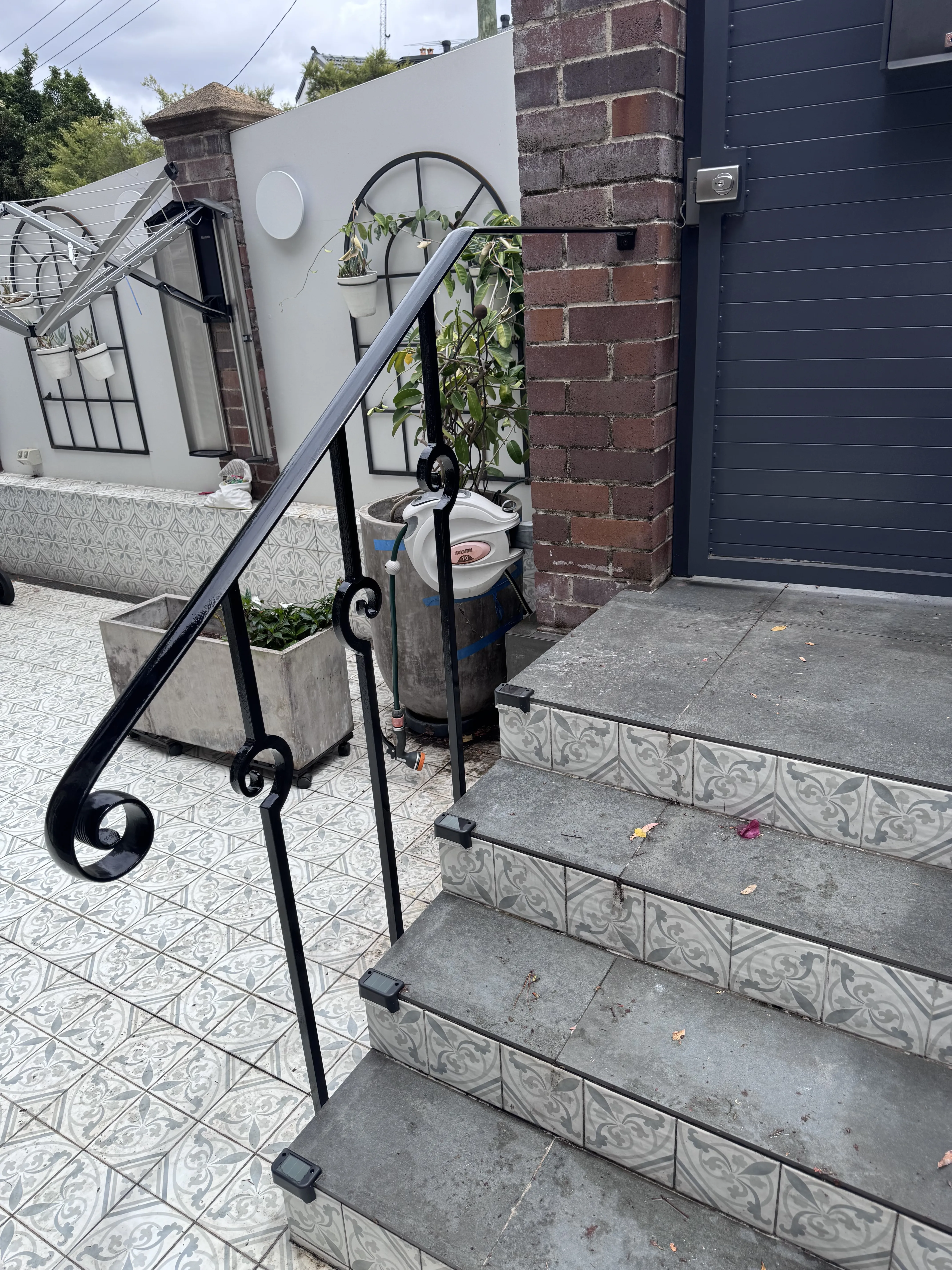 Decorative scrollwork handrail crafted for Mosman home